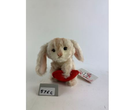 Steiff rabbit with heart, 033506, seated rabbit holding a red felt heart embellished with a single small crystal, in cream mo