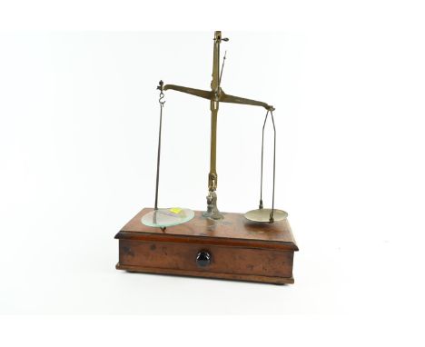 A set of Victorian travelling apothecary scales by W & T Avery Ltd. Birmingham, with one drawer containing various weights 