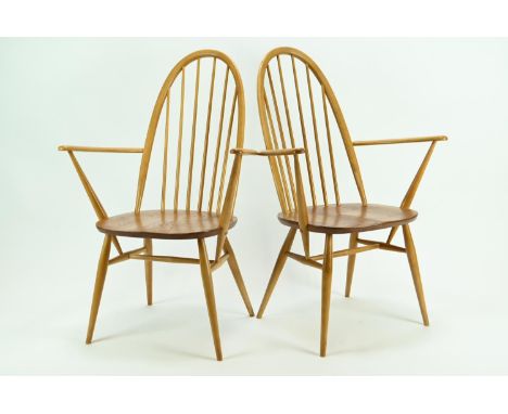 Pair of Ercol 365A Quaker armchairs. Natural finish, with original seat pads.Structure is solid, no signs of damage or repair