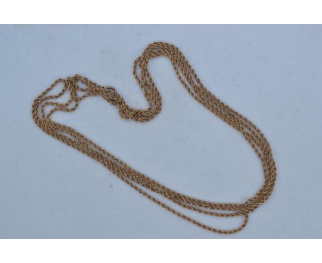 Yellow metal long chain, tests positive for 9ct gold, circumference approximately 1,260mm, 11.6 grams 