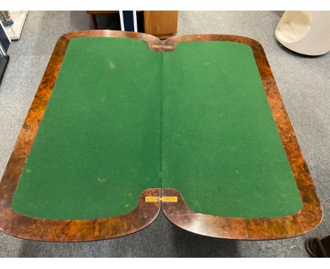 Flame mahogany folding card table with good green baize, carved legs, turned cross section  and original ceramic castors. Inc