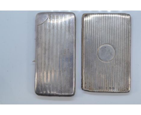 Two silver mounted folding card cases, Mappin & Webb Ltd and the other with maker's mark rubbed, both Birmingham 1916, with e