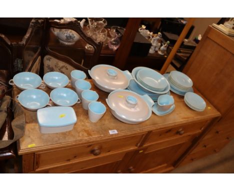 A collection of Poole twin tone tea and dinnerware 