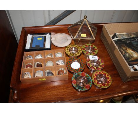 A Kisii stone ash tray; a Mappin & Webb silver plated photo frame; six enamel decorated tea light holders; miniature pottery 