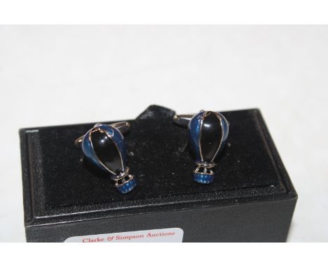 A pair of enamel decorated cuff-links in the form of hot air balloons 