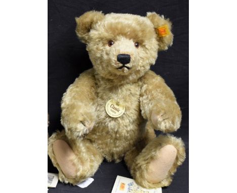 A Steiff teddy bear, classic 1920's style, blonde mohair, with growler, yellow ear tag