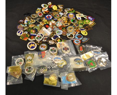 A collection of 130 gilt and enamel bowling badges