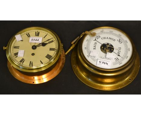 A wall mounted brass clock, Roman numerals, subsidiary dial; a circular aneroid barometer, by Foster Callear, (2) 