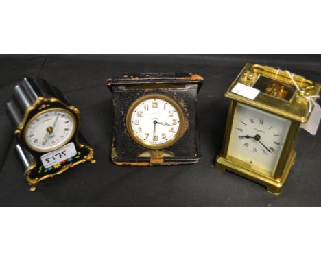 A Bayard eight day carriage clock; an eight day leather cased carriage clock; a musical alarm clock (3)