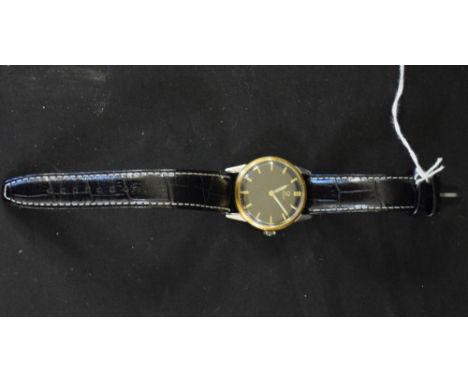 Omega - a 1950's wristwatch, gloss black dial, gilt block baton markers, minute track, luminous hands, manual 268 cal 15 jewe
