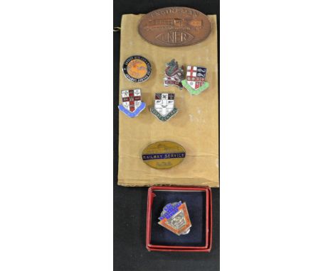 A silver and enamel NVR 30 years badge; seven Railway Company badges