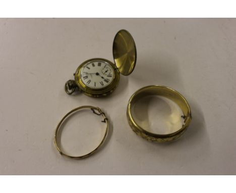 A gold plated bangle together Timex Hunter pocket watch; and a 9 carat gold and metal bangle