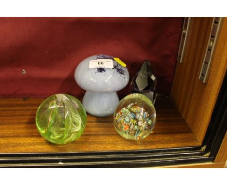 A Caithness paperweight and three other paperweights