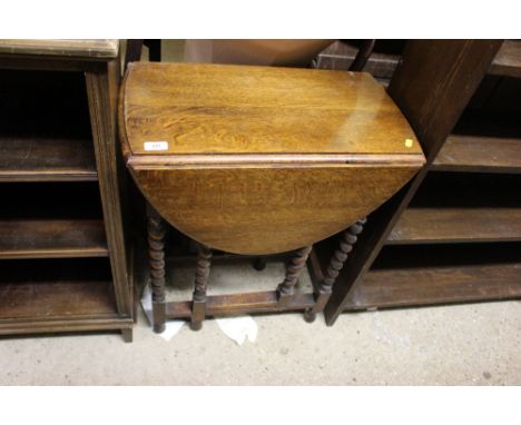 A small oak barley twist gate legged table