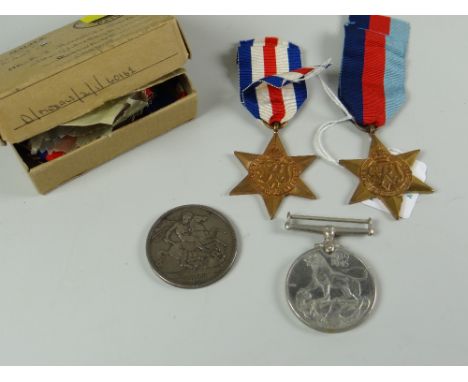 A WWII medal replacement group for Mr R J Howells-Jones with original box and papers, comprising 1939-45 Star, a France & Ger