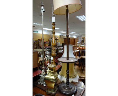 A parcel of lighting including two standard lamps & a brass effect table lamp etc