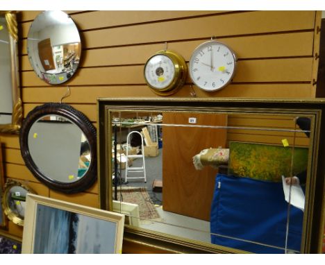 Three various mirrors, a brass effect barometer & a modern wall clock