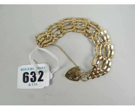 A 9ct yellow gold gate bracelet with heart shaped padlock, 10grms