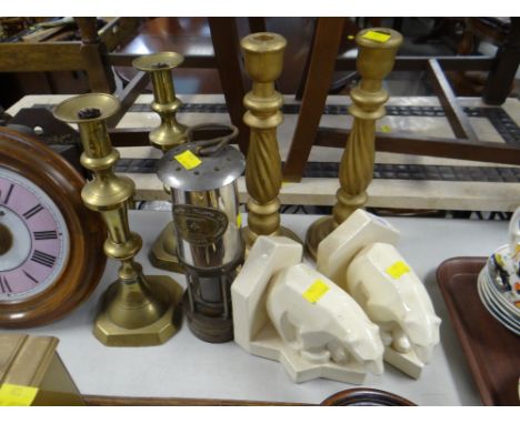 Two pairs of candlestick holders, a Thomas & Williams miner's lamp together with a pair of polar bear bookends