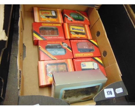 A qty of eight Hornby closed Wagons and a 060 Dapol engine