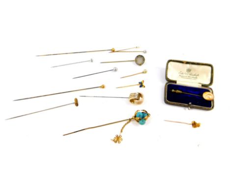 A Victorian novelty oval tie pie set with oyster shell, a further tie pin set with a ruby in yellow metal, together with dres