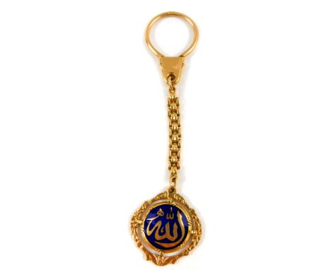 A Middle Eastern 18ct gold and blue enamel fob on chain, 12.3g.