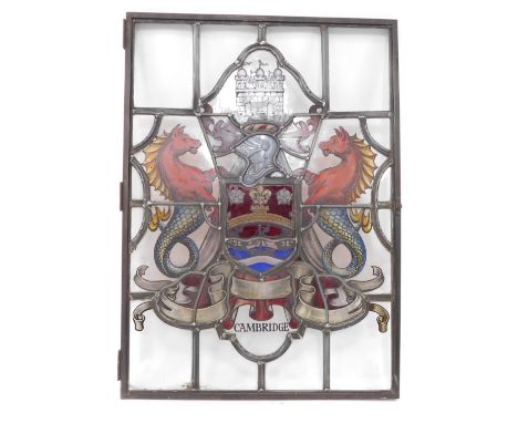 A stained glass window panel, bearing the Coat of Arms of The City of Cambridge, 86cm high, 62cm wide.
