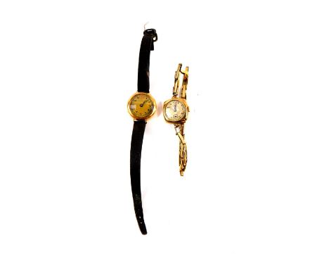 A lady's 9ct gold wristwatch, circular silvered dial with engine turned chequerboard decoration, bearing Arabic numerals, sub