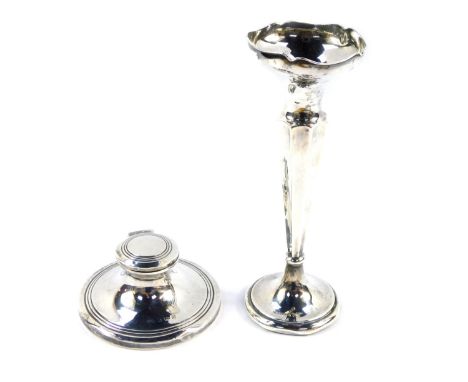 A George V silver loaded capstan inkwell, Birmingham 1911, together with a loaded silver bud vase, Birmingham 1912, 17.5cm hi