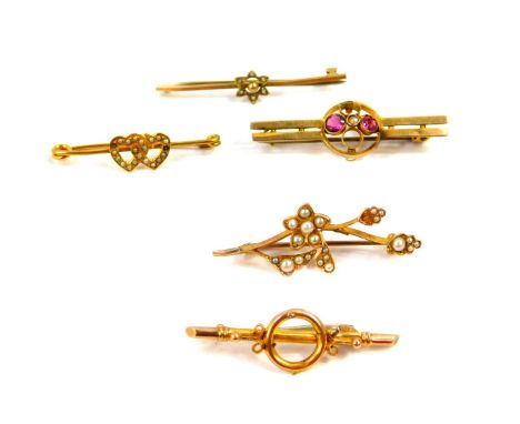 A Victorian 9ct gold amethyst and seed pearl set bar brooch, three seed set bar brooches, two floral, one with entwined heart