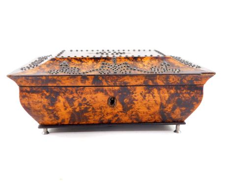 A Regency burr yew wood sarcophagus form casket converted to a musical box, the hinged lid with steel pin work decoration, mo
