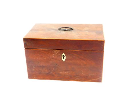 A George III mahogany tea caddy, of rectangular section with boxwood line inlay, the hinged lid opening to reveal a single co