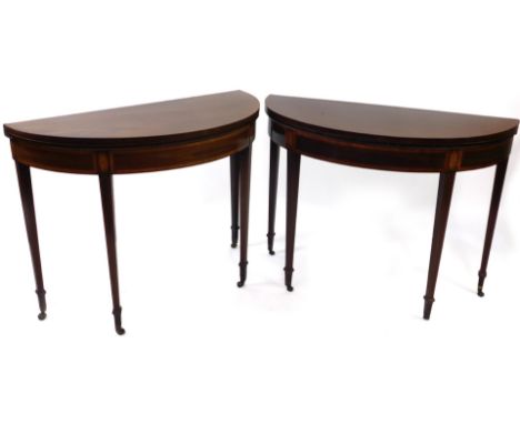 A pair of George III flame mahogany demi lune tables, one being a tea, the other a card table, with satin wood cross banded t