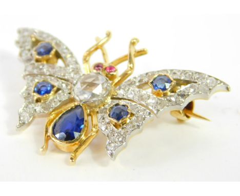 A diamond ruby and sapphire butterfly brooch, set in white and yellow metal, 4.6g.