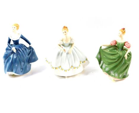 Three Royal Doulton figures, comprising Michele HN2234., Fragrance HN2334., and First Dance HN2803.