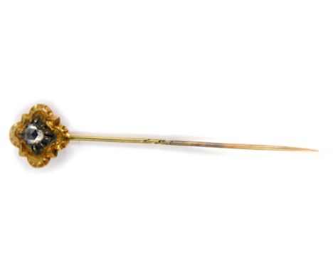 A Victorian stick pin set with an old cut diamond, in white and yellow metal, approx 0.4cts.