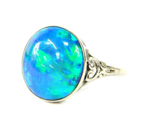 An oval opal doublet set ring, in white metal, stamped 9ct, size O, 3.2g.