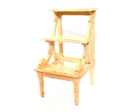 A set of Victorian style cream painted library steps, of three step form, with scrolling supports, raised on turned legs, 80.