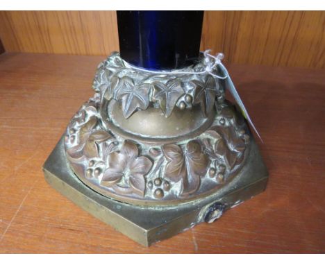 A RARE BRISTOL BLUE GLASS OCTAGONAL PILLAR LAMP STAND WITH CAST BRONZED BASE WITH IVY DECORATION (NEEDS REWIRING)