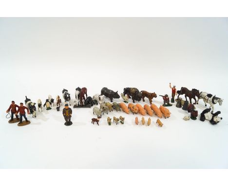 Assorted lead farm and zoo animals, and figures, including a Johillco rolling panda