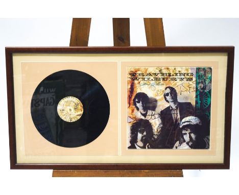 A signed travelling Wilburies album by Bob Dylan, George Harrison, Tom Petty and Jeff Lynne