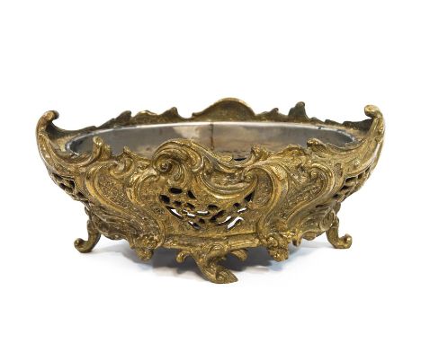 A pierced brass planter, heavily cast in the Rococo style with metal line, 35cm wide