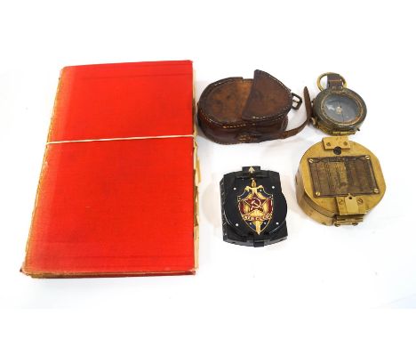 A WWI military compass, leather cased, a brass compass, a Russian compass with enamel badge to lid, and Fortescue's History o