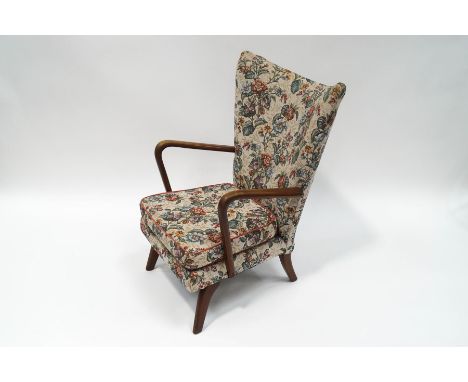A 1950's beech frame armchair, sold as a collector's item only