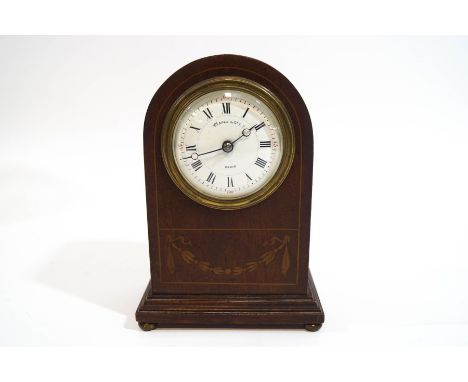 An Edwardian Maple & Co mantel clock, with dome top, with winding key, 15cm high