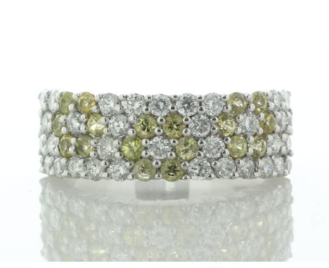 A charming semi eternity diamond ring with four rows multiple pave set round brilliant cut diamonds with fifteen round yellow