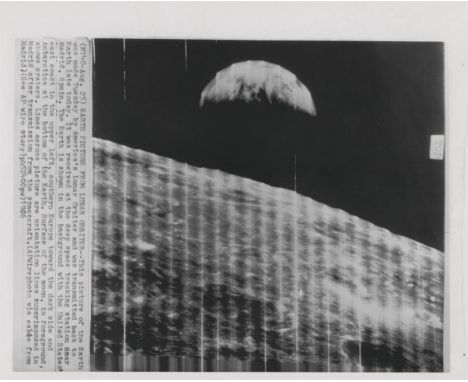 
	
		The celebrated first photograph of the Earth taken by the first American spacecraft to orbit the Moon, Lunar Orbiter 1, 