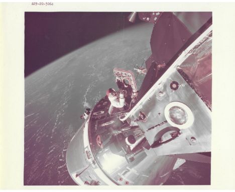 
	
		Russel Schweickart
		View of the docked Apollo 9 Command/Service Modules and Lunar Module, with Earth in the background,