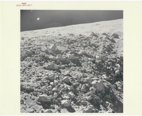 
	
		John Young
		Debris-strewn terrain at Station 4, EVA 2
		Apollo 16, 16-27 April 1972
		Vintage chromogenic print on fibr