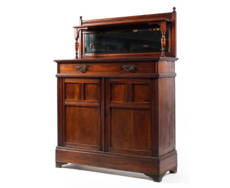 A late Victorian mahogany sideboard, with mirrored back and galleried shelf on baluster supports, with frieze drawer with pie